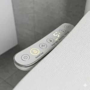 Close-up of the side control panel for adjusting water temperature on a bidet heated unit.